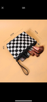 Zippered clutch checkerboard bag with leather patch