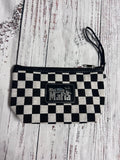 Zippered clutch checkerboard bag with leather patch