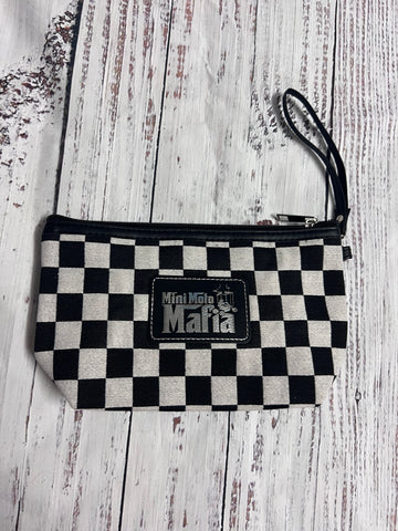 Zippered clutch checkerboard bag with leather patch