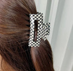 Checkerboard claw clip
