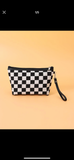 Zippered clutch checkerboard bag with leather patch